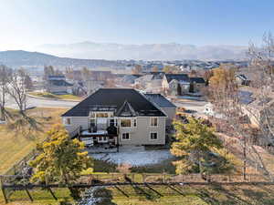 Back of property featuring a mountain view