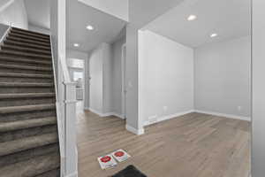 Interior space with hardwood / wood-style floors