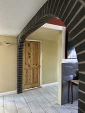 Stairway with hardwood / wood-style flooring