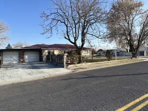 View of front of property featuring a garage