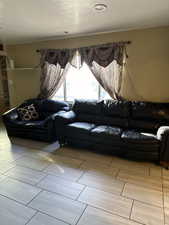 Living room with light wood-type flooring