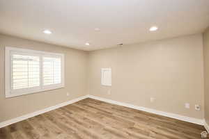 Unfurnished room featuring light hardwood / wood-style floors