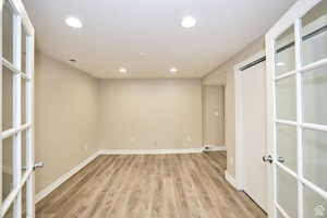 Spare room with light hardwood / wood-style flooring