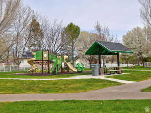 View of playground featuring a yard