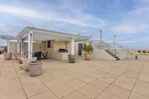 View of patio featuring a pergola