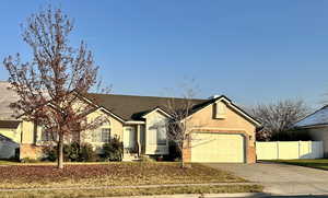 Ranch-style home with a garage