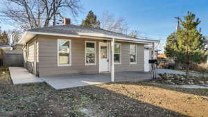 View of front of home featuring a patio area