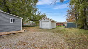 View of yard with an outdoor structure