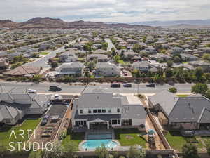 Birds eye view of property featuring a mountain view