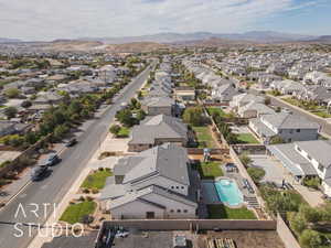 Birds eye view of property featuring a mountain view