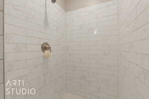 Bathroom with tiled shower