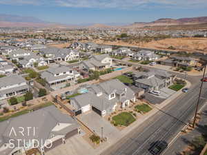 Birds eye view of property with a mountain view