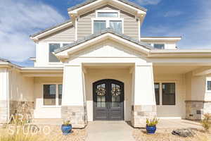 Doorway to property featuring french doors