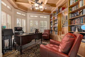 Office space featuring ceiling fan, plenty of natural light