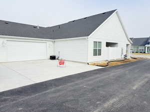 Exterior space with a garage