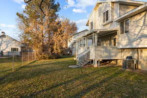 View of yard featuring central AC unit