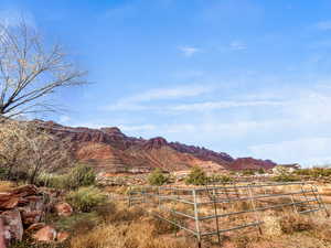 Property view of mountains with a rural view