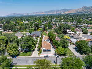 Birds eye view of property with a mountain view