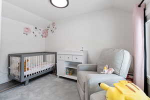 Bedroom with a large window for natural lighting