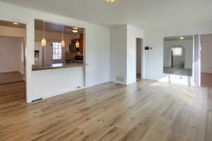 Unfurnished living room featuring light hardwood / wood-style flooring