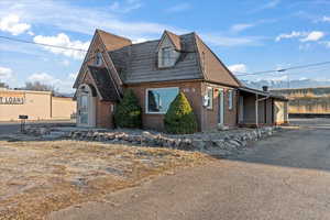 View of front of property featuring a mountain view