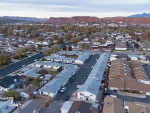 Birds eye view of property with a mountain view