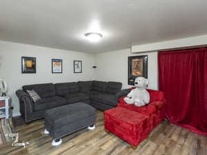 Living room featuring hardwood / wood-style floors