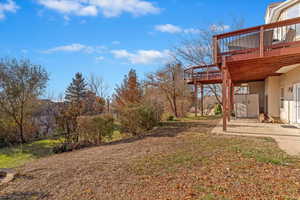 View of yard featuring a deck