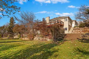 View of yard featuring a deck