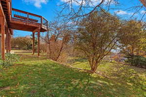 View of yard featuring a wooden deck