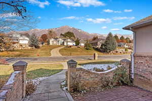 View of patio with a mountain view