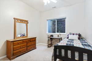 Bedroom with carpet flooring and ceiling fan