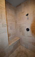 Bathroom with a tile shower