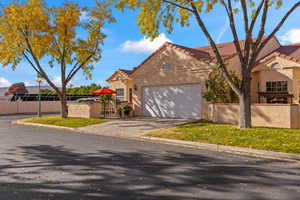 View of front of home featuring a garage