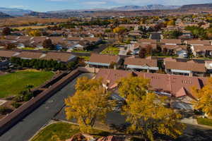 Birds eye view of property with a mountain view