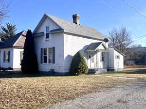 View of home's exterior featuring a yard