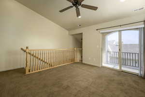 Living room featuring ceiling fan, a mountain view, and vaulted ceiling