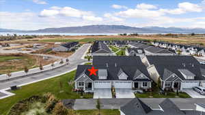 Birds eye view of property featuring a mountain view