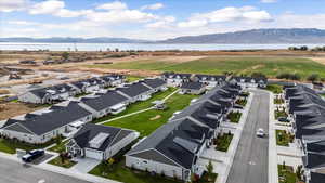 Aerial view featuring a water and mountain view