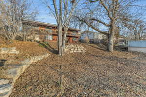 Rear view of property with a deck