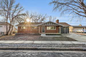 Single story home featuring a garage