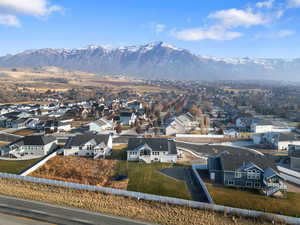 Birds eye view of property featuring a mountain view