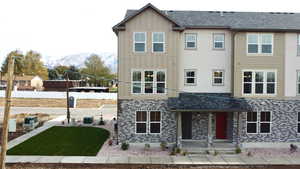 Rear view of house with a mountain view