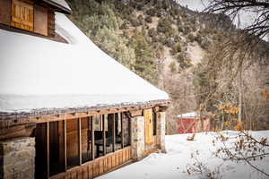 View of yard covered in snow