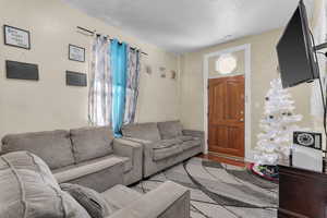 Living room featuring light hardwood / wood-style floors