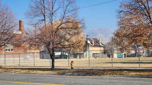 Roof of Subject in background. Field & Building to the left will be Ivory development.