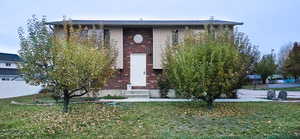 View of front of house with a front lawn