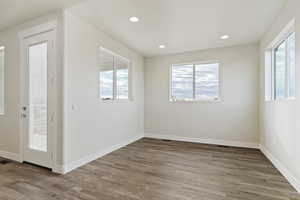 Spare room with light hardwood / wood-style flooring