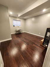 Bedroom 4 featuring dark wood-type flooring