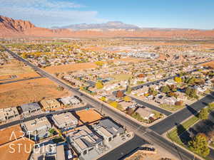 Birds eye view of property with a mountain view